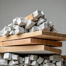 pile of construction debris with wood scraps and drywall