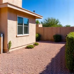 Backyard completely free of junk and debris after a professional cleanup, demonstrating ample space for outdoor activities in Oro Valley.