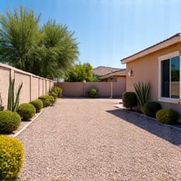 After: Spotless Green Valley residential yard following construction debris removal. This image shows the backyard in Green Valley, AZ, completely cleared of all construction materials and waste, demonstrating effective junk removal.