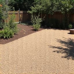 After decomposed granite installation in an Oro Valley backyard, displaying a smooth, uniform surface perfect for a desert-friendly outdoor living space.