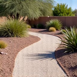 After gravel pathway installation in an Oro Valley garden, providing a clean and inviting walkway with excellent drainage.