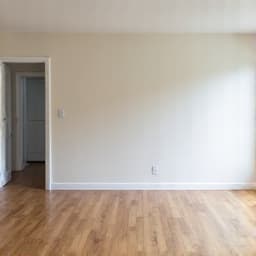 Cleaned and empty room after hoarder house cleanout in Oro Valley. This image shows a fully cleared room, demonstrating the significant transformation achieved by professional cleanout services.