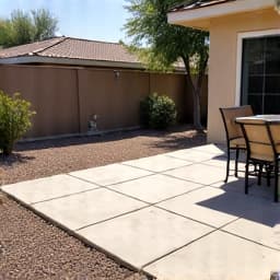 Patio extension with decorative gravel at a Green Valley home