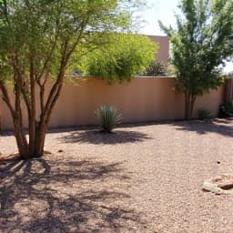 After image of an immaculate yard in Vail, Arizona, with all brush cleared, revealing a well-maintained and aesthetically pleasing outdoor space.
