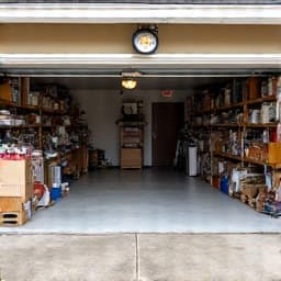 Before: Cluttered garage awaiting an estate cleanout in Tucson
