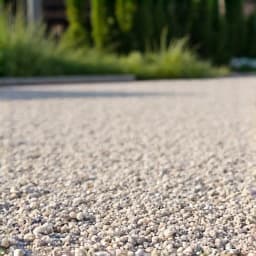 Patio area with fresh gravel installation at a Tucson property