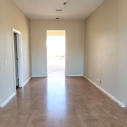 After estate cleanout in Green Valley, AZ, showcasing a clean and empty room ready for staging or sale, near Green Valley Recreation facilities. Expert junk removal after an estate cleanout.